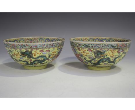 A pair of Chinese eggshell porcelain bowls, mark of Qianlong but mid-20th century, each of hemispherical form, enamelled insi