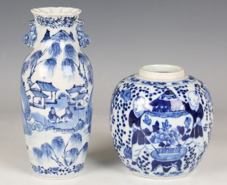 A Chinese blue and white porcelain vase, mark of Kangxi but late 19th century, painted with figures and buildings in landscap