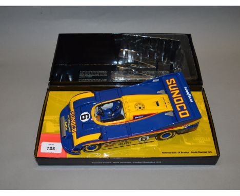 A boxed Minichamps Porsche 917/30 Can Am 1973 M. Donohue diecast model car in 1:18 scale. Model appears G+ in generally G+ bo