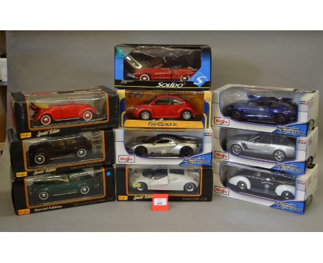 10 x 1:18 scale diecast model cars by Maisto, Solido and similar, including a number of Volkswagen cars. G-VG, boxed.