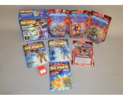 Mattel Masters of the Universe and He-Man: He-Man Skullcopter; He-Man Rocketdisc Power Pack; He-Man Vizar; four Masters of th