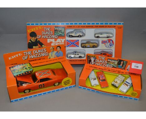 A boxed ERTL 'Dukes of Hazzard' #1791 General Lee Car diecast model in 1:25 scale together with a #1570 boxed set of four min