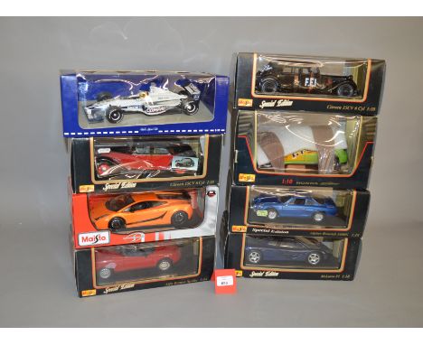 Eight 1:18 scale diecast model cars, mostly Maisto but one Minichamps, including McLaren F1, Alpine Renault 1600S, Alfa Romeo