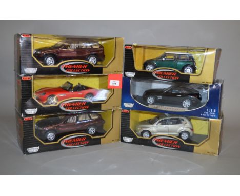 Six Motor Max 1:18 scale diecast model cars, including BMW and Chrysler. E in G boxes. (6)