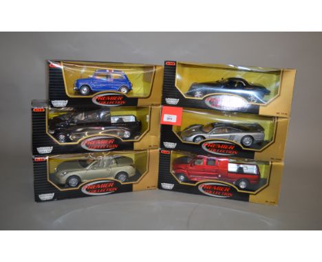 Six Motor Max Premier Collection 1:18 scale diecast model cars and trucks, including Saleen S7 and Ford Super Chewzer. E in G