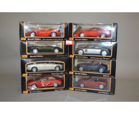 Eight Maisto 1:18 scale diecast model cars, including Jaguar and Audi. Boxed and E. (8)