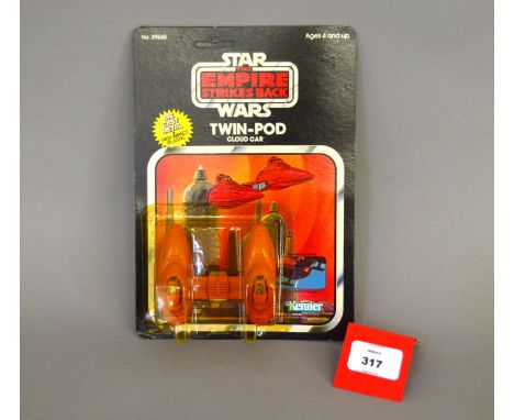 Kenner Star Wars The Empire Strikes Back Twin-pod Cloud Car diecast model. M, sealed in VG-E but yellowed bubble on VG-E unpu