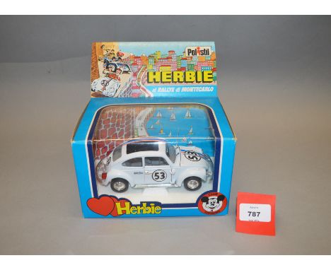 A boxed Polistil diecast model of the Volkswagen Beetle 'Herbie' in 1:24 scale, reference W12. Model appears VG/E in VG box. 