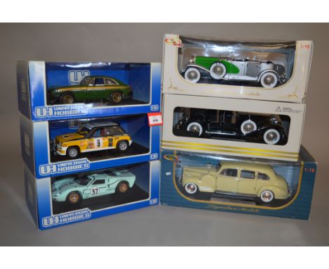 Six 1:18 scale diecast models: three Universal Hobbies (MGB GT, Renault 5 Turbo, Ford GT 40); three Signature Models (1930 Pa