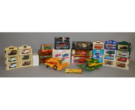 A mixed group of boxed diecast models by Lledo, Corgi, Bburago and others, in various different scales, including a boxed Ony