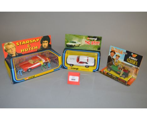 Three Corgi Toys TV related diecast models, #292 Starsky & Hutch Ford Torino, #320 The Saint Jaguar XJS and #9004 'The World 