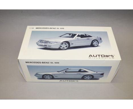 A boxed Autoart Millennium Mercedes Benz SL 600 diecast model in 1:18 scale, VG in G+/VG box. 