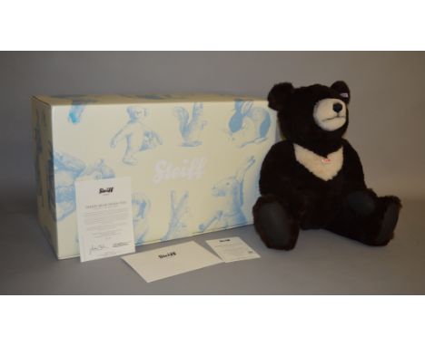 Steiff Teddy Bear Moon Ted, ltd.ed. 453/1500, dark brown and cream alpaca, height 60 cm. Boxed, with certificate and chest ta