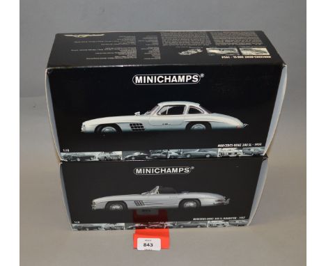 Two boxed Minichamps Mercedes Benz 300 SL diecast model cars in 1:18 scale, a 1954 car and a 1957 Roadster. Models appear VG 