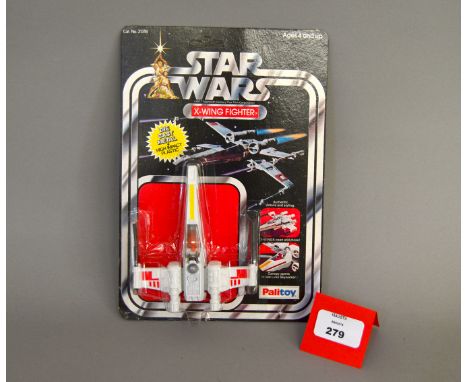 Palitoy Star Wars X-Wing Fighter diecast model. M in E clear bubble on E unpunched card.