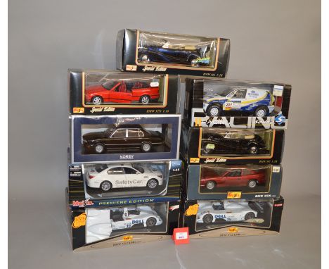 Nine BMW 1:18 scale diecast model cars by Maisto, Norev and Solido. VG in G-VG boxes. (9)