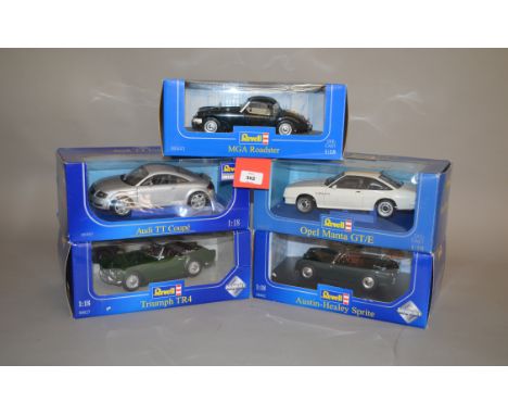 Five Revell 1:18 scale diecast model cars: Triumph TR4; Audi TT Coupe; Austin-Healey Sprite; Opel Manta GT/E; MGA Roadster. B