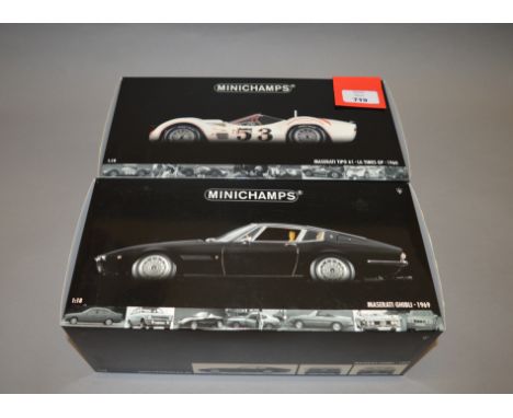 Two boxed Minichamps Maserati diecast model cars in 1:18 scale, a Ghibli - 1969 and a Tipo 61 - LA Times GP - 1960. Models ap