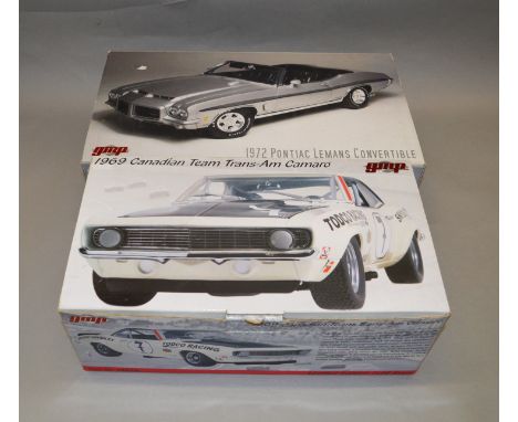 Two boxed gmp diecast model cars in 1:18 scale, 1969 Canadian Team Trans-Am Camaro and a 1972 Pontiac Le Mans Convertible, bo