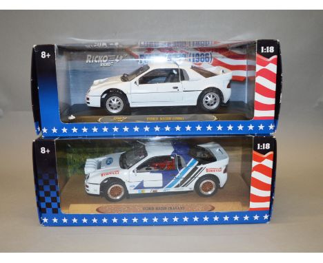 Two boxed Ricko diecast model cars in 1:18 scale, Ford RS200 (1986) and a Ford RS200 (Rally), both appear VG in G+/VG boxes. 