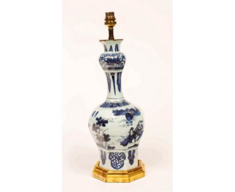 An 18th Century Delft octagonal bottle vase with onion bulb neck, chinoiserie decorated, fitted as a lamp, 34.5cm high