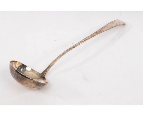 An Irish silver ladle, Samuel Neville, Dublin 1803, of fiddle and thread pattern, crested, 37.5cm long approximately 213gm