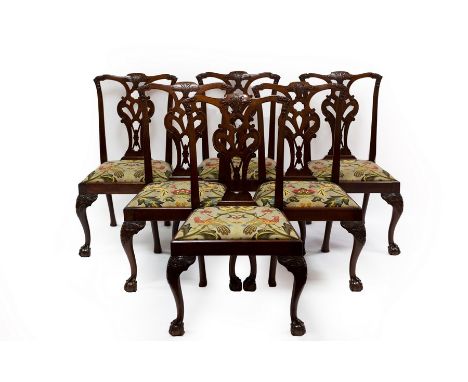 A set of six Chippendale style mahogany splat back dining chairs, on carved front legs with claw and ball feet/see illustrati