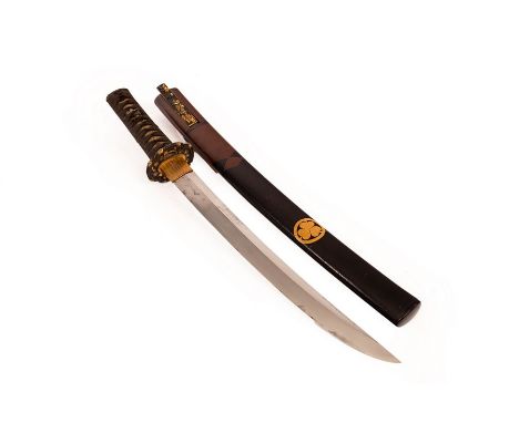 A Japanese wakizashi short sword, the scabbard with decorative mon, total length 64.5cm/see illustration CONDITION REPORT: Sh