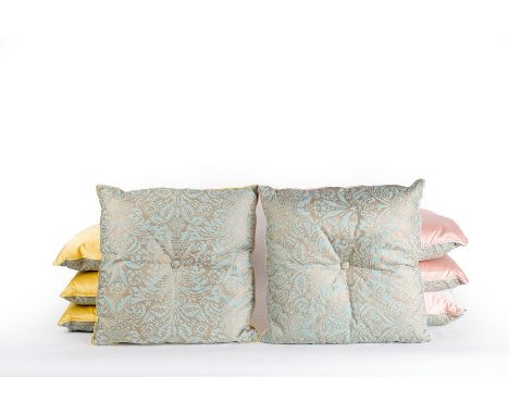 Eight patterned cushions with single central covered button and piped edges, four having yellow cotton sateen backs and four 