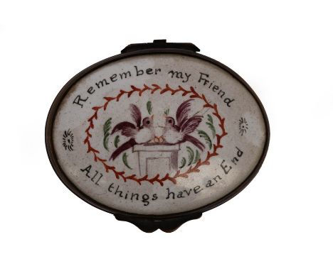 A late 19th Century French oval patch box, the lid painted with love birds and motto, having a pink base, 5cm wide/Provenance