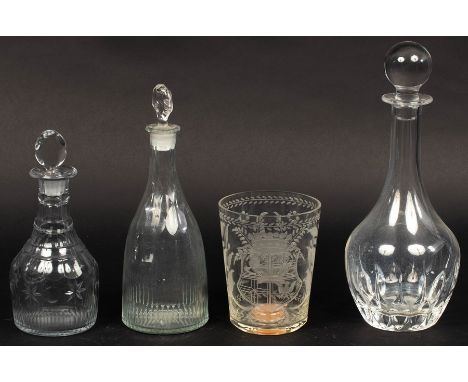 A Swedish glass beaker engraved an armorial with an 18th Century coin set in the base, 14.5cm high and three decanters and st