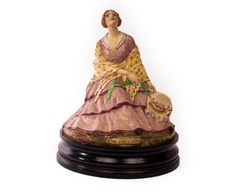 A ceramic figure entitled 'The Larks Song', modelled by Dorothea Selous, 20cm high (including wooden plinth)