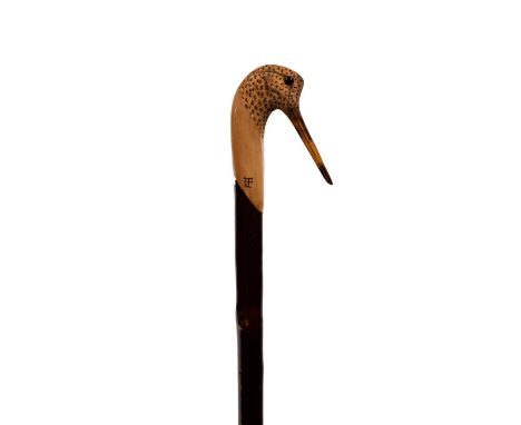 A walking stick with woodcock terminal, hand carved by Ian James, 136cm long/see illustration