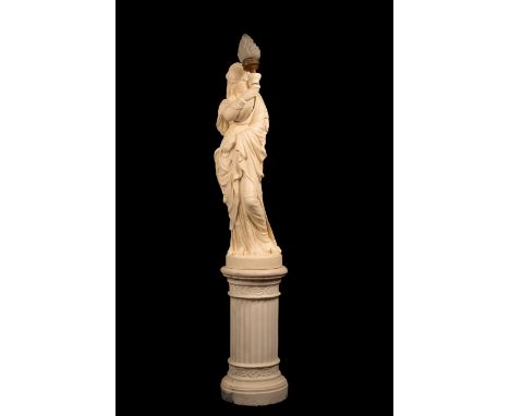 A French lamp modelled as a white plaster figure of a maiden with flowing robes and holding a flaming torch aloft, on a flute