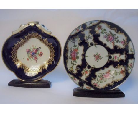 A Worcester blue scale ground saucer dish, circa 1770, 19cm diameter and a blue ground shell-shaped dessert dish, 19.5cm diam