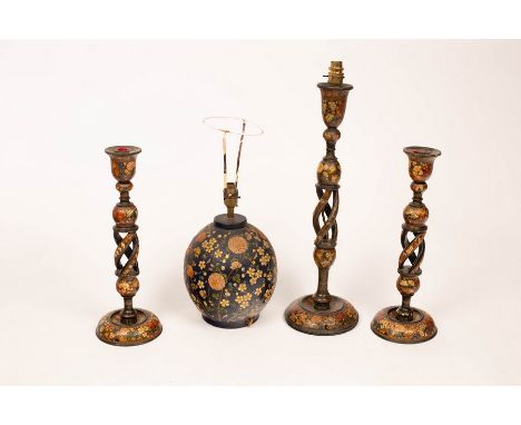 A pair of Kashmiri candlesticks, 40cm high, another (damaged) and an ovoid lamp base CONDITION REPORT: Both Candlestick nozzl