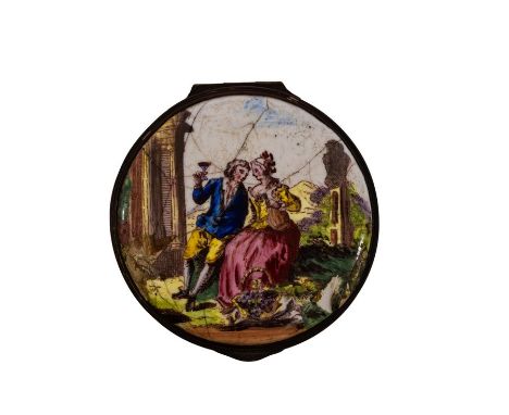 A late 18th Century Staffordshire circular snuff box, the lid printed in colour with a boy and girl drinking near ruins, 5cm 