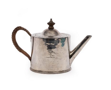 A George III silver saffron teapot, Walter Brind, London 1774, of drum shape with wicker bound handle, 12cm high approximatel