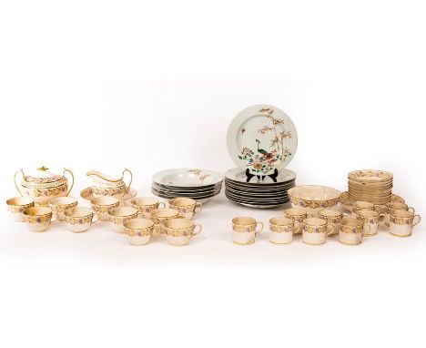 A quantity of early 19th Century china, to include teacups, coffee cups and other china with gilt and puce floral borders and