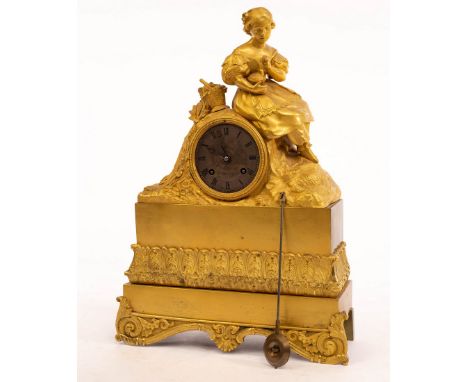 A French gilt metal mounted mantel clock, the surmount modelled as a girl holding a nest, 38.5cm high CONDITION REPORT: The c