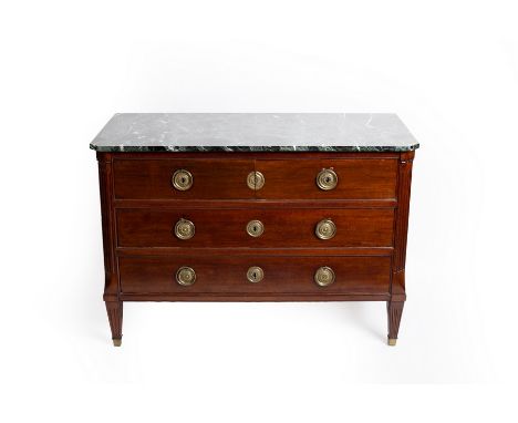 A Continental walnut marble top commode of two short over two long drawers, flanked by canted fluted sides on square tapering
