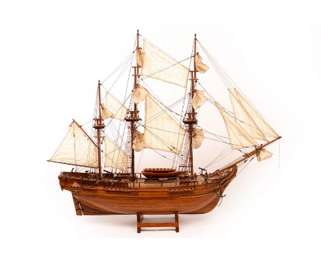 A scale model of a three-masted ship on stand, 74cm high x 89cm long