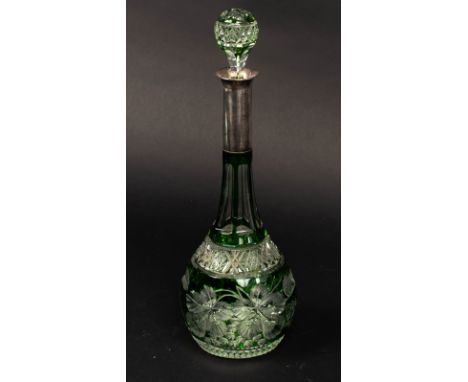 A green flash cut glass decanter with a German .800 standard silver collar, 39cm high