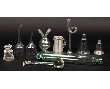 A group of small glass items, 18th and 19th Century, comprising a wrythen fluted ear trumpet, two wine funnels, an oil and vi