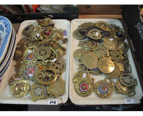 Two trays of assorted horse brasses to include, National horse brass society 1996 and 2006 etc., Royal Worcester 2002 commemo