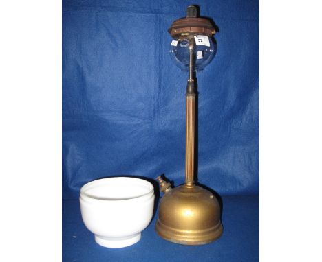 Gilt metal Tilley lamp number 182 with cream shade. CONDITION REPORT: Glass globe appears undamaged.
Shade appears ok
Tank is