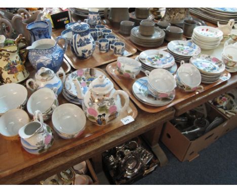 Two trays of Japanese eggshell tea ware, overall decorate on a white ground with figural and landscape scenes comprising teap