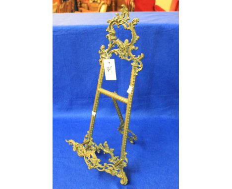 20th Century gilt metal table top easel pierced with scroll and floral decoration.