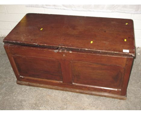 Pine double panelled trunk on a platform base.