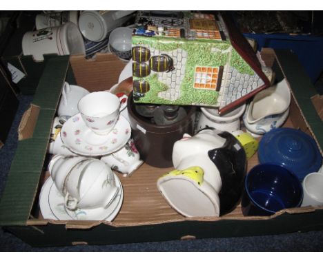 Tray of assorted china to include various floral part tea ware, lidded jar in the form of a lady's head, stoneware utensil ja
